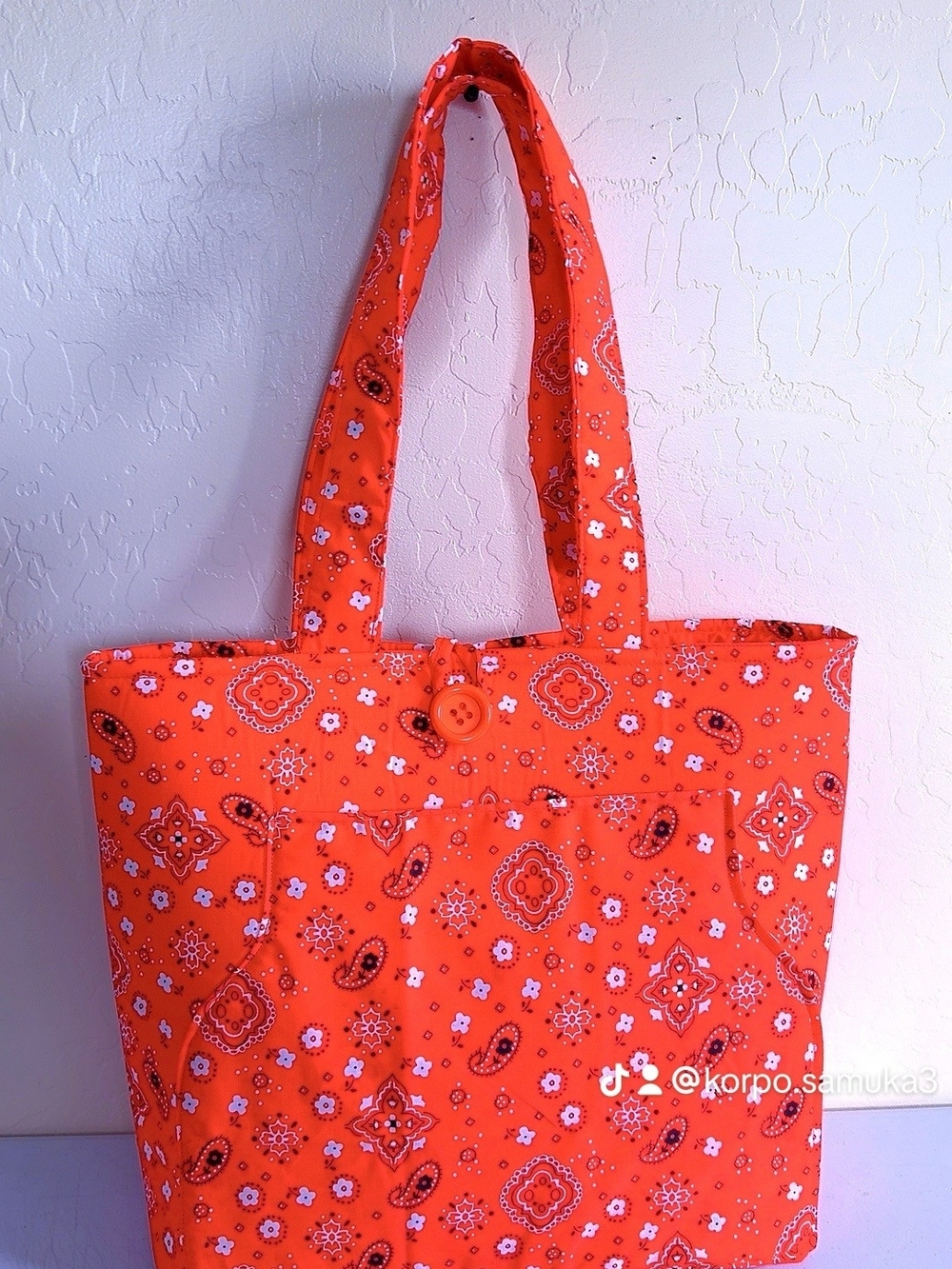 Vibrant Orange Patterned Tote Bag with Front Pocket